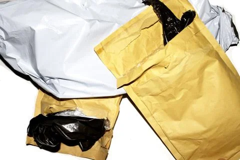 Packing envelope padded mailer bag opened and empty recycling shipping post.. Stock Photos