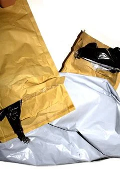 Packing envelope padded mailer bag opened and empty recycling shipping post.. Stock Photos