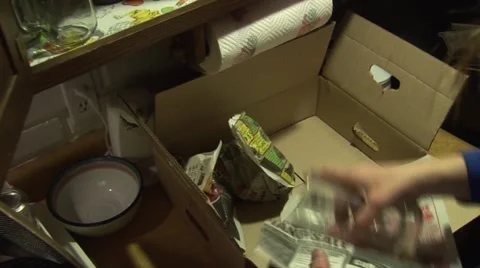 Packing Glasses - Moving Stock Footage 60756877