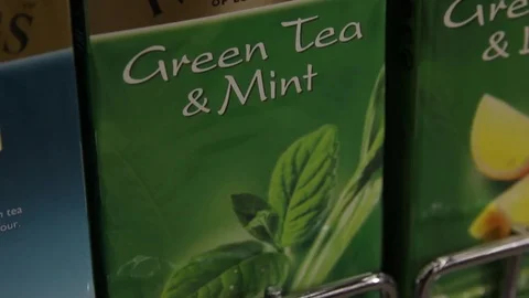 Packing of green tea with mint, close-up Stock Footage 75476559