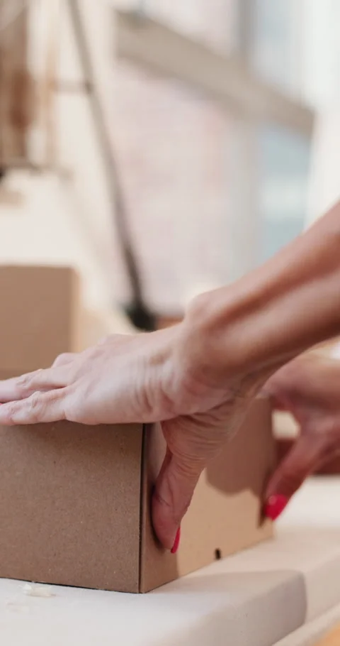 Packing, logistics or hands in workplace with package, box sorting or stock Stock Footage 333443563