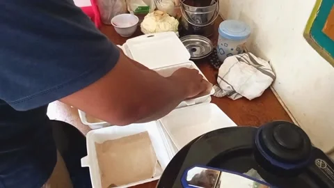 Packing lunch using Styrofoam Stock Footage 164877968