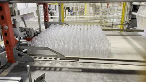 Packing machine for plastic bottles Stock Footage 266882702