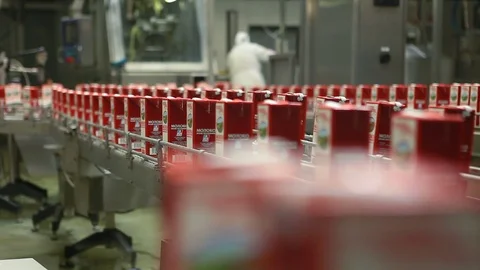 Packing milk. The conveyor for packaging milk. Stock Footage 70867073