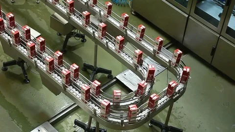 Packing milk. The conveyor for packaging milk. Video stock 70867261