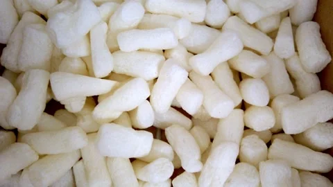 Packing peanuts of a amazon delivery box close up Stock Footage 328480646