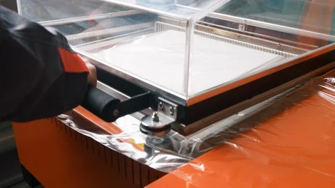 Packing by plastic bag box Stock Footage 121227431