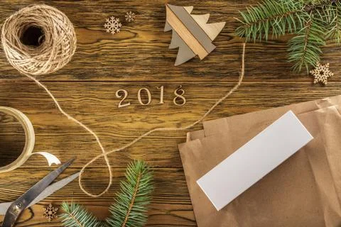 Packing a smartphone for a gift. The mess on the table. Place for text. The v Stock Photos