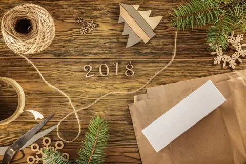 Packing a smartphone for a gift. The mess on the table. Place for text. The v Stock Photos