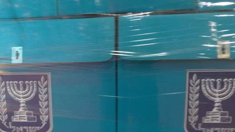 Packing a stack of ballot boxes for distribution Видео 104169736