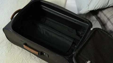 Packing suitcase 4 Stock Footage