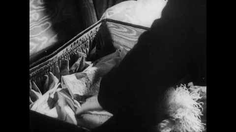 Packing two suitcases, one for the man, another for his wife, UK 1939 Stock Footage 132022949