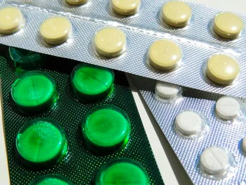 Packings with tablets, medicine on the table Stock Photos