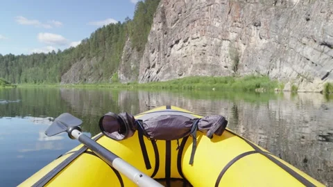 Packrafting on calm river Stock Footage 266505404