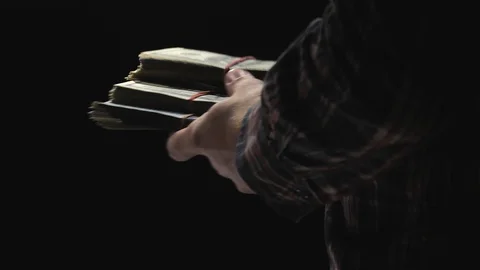 Packs of dollars are thrown on the table. Video stock 129786623