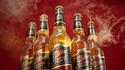 Packshot beer stands still within haze in slow motion Stock Footage 148158588