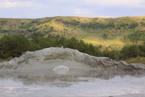 Paclele Mari mud volcano boiling in Romania Stock Photos