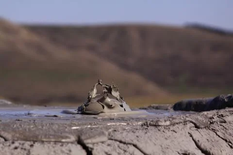 Paclele Mari mud volcano boiling in Romania Foto stock