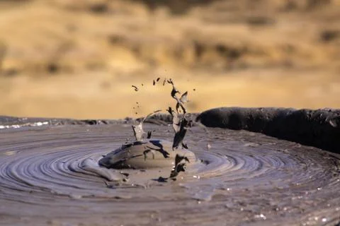 Paclele Mari mud volcano boiling in Romania 写真素材