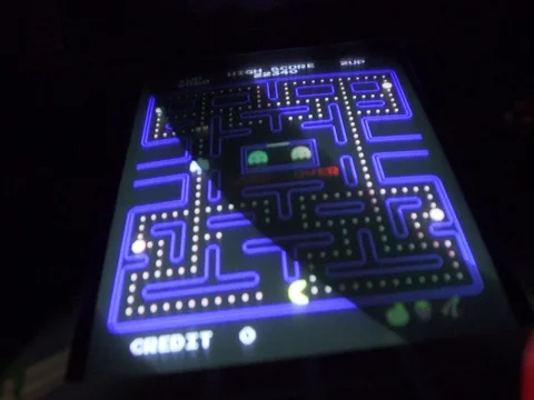 Pacman Video Game Arcade on screen vintage eightees ninetees Stock Footage 78609654