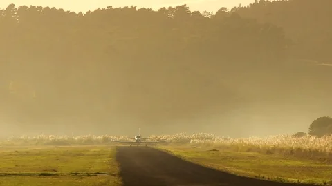 PACXL-750 Airplane Take Off Small Airfield New Zealand Stock Footage 101641771
