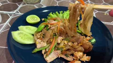 Pad See Ew Noodles at a Restaurant in Chiang Mai, Thailand Stock Footage 259851139