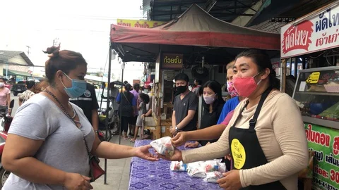 Pad Thai shop stall donation, HuaHin, Thailand Stock Footage
