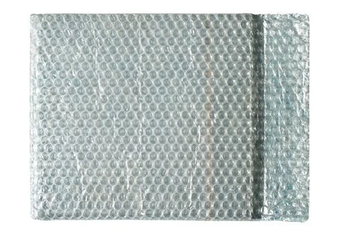 Padded envelopes with plastic air bubble wrap on white background, air bubble Stock Photos