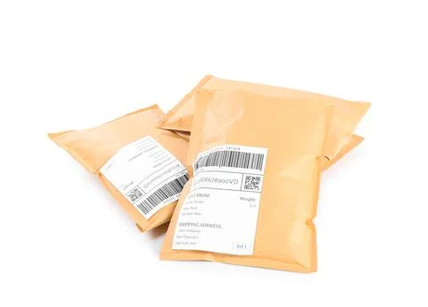 Padded envelopes on white background. Parcel delivery Stock Photos