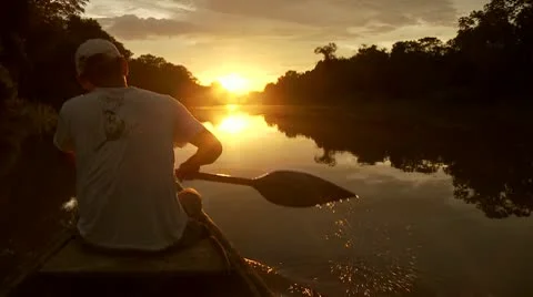 Paddeling On Amazon River In Sunset Stock Footage 10798747