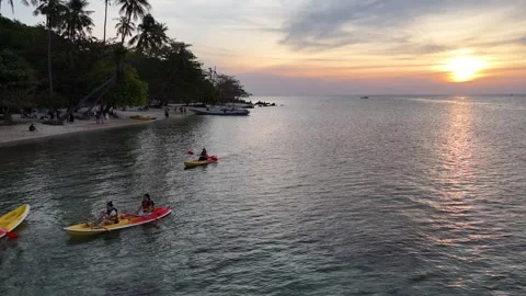 Paddle Beach in Sunset beach 動画素材 297594924