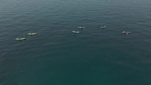 Paddle board adventures on the lake. Summer water sport activities  Stock Footage 164637088