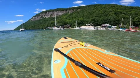 Paddle board on lake 库存影片 243241080