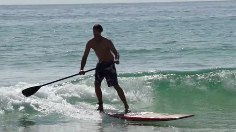 Paddle board surfing Stock Footage 31690013