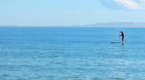 Paddle boarder in the ocean Stock Footage 39742202