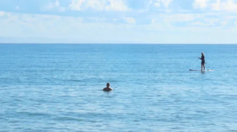 Paddle boarder in the ocean Stock Footage 39755492