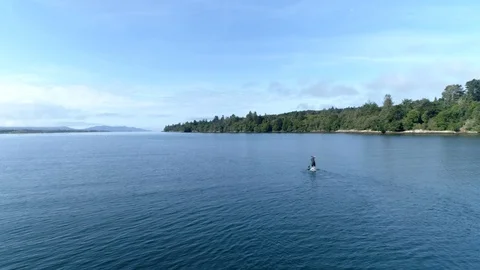 Paddle Boarder passing by 動画素材 94578793
