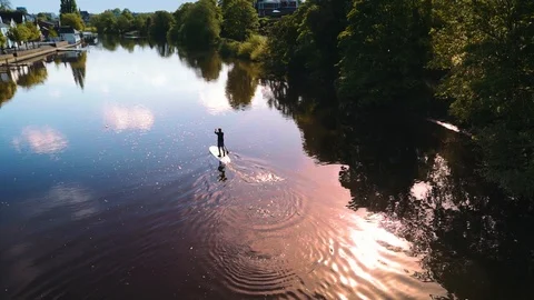 Paddle boarder on the River Dee in Chester Stock Footage 89756707