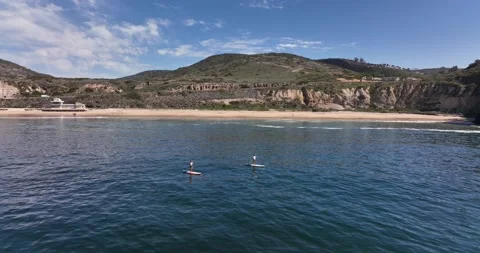 Paddle Boarders with Mountains Stock Footage 230488172