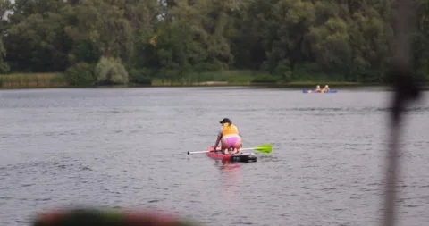 Paddle boarding and kayaking. Stock Footage 256245389