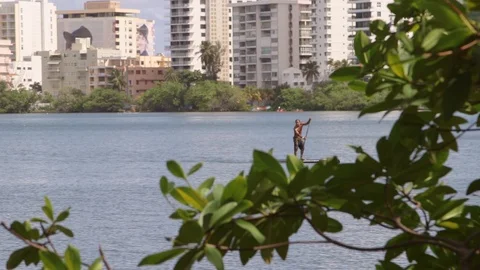 Paddle boarding in El Condado Stock Footage 88225797
