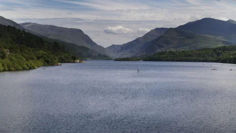 Paddle boarding on Llyn Padarn lake in Snowdonia National Park 스톡 동영상 336810536
