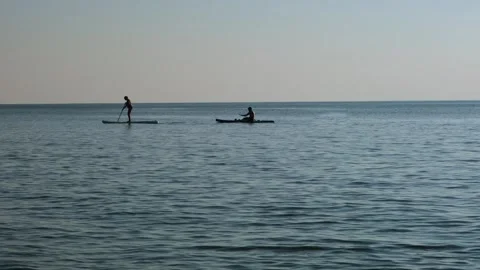 Paddle boarding on the sea. Stock Footage 292649377