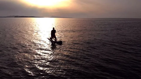 Paddle boarding at sunset Stock Footage 91495688