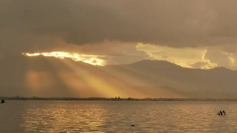 Paddle boat with a beautiful sunset in the background Stock Footage 81422412