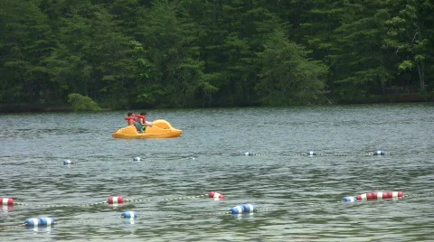 Paddle boat in the lake Stock Footage 488381