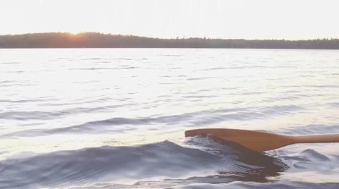 Paddle rowing in water slow motion 120fps Stock Footage 64983252