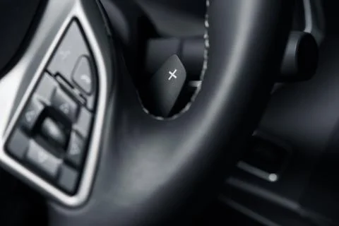 Paddle shift gearbox plus paddle closeup. semi-automatic transmission. Photos