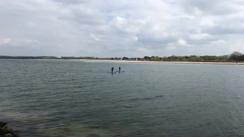 Paddle surf in Baltic Ocean Germany Stock Footage 153407816