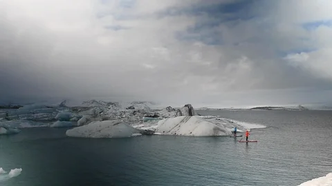 Paddle surfers in iceland Stock Footage 101151087